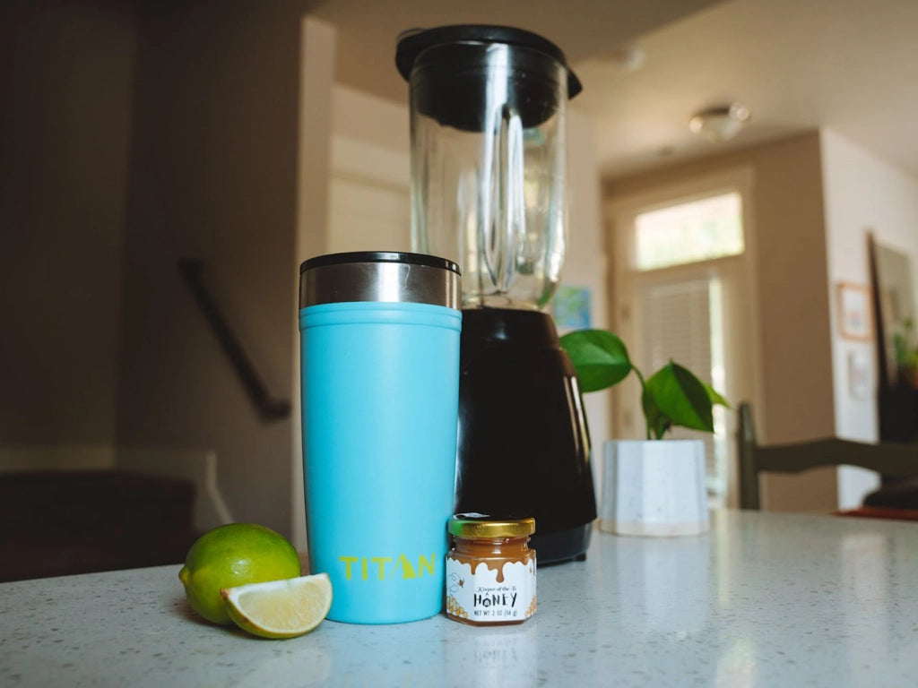 Titan 20 Oz Tumbler with margarita ingredients on a kitchen counter