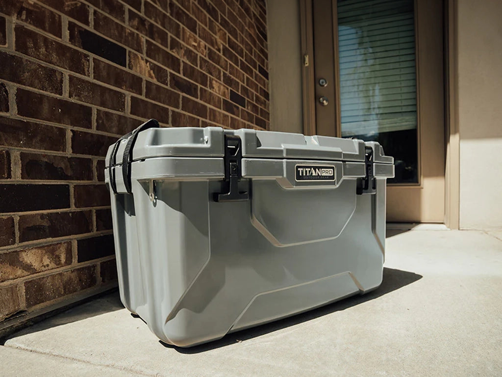 Titan PRO 55Q Roto Hard Cooler outside on a porch