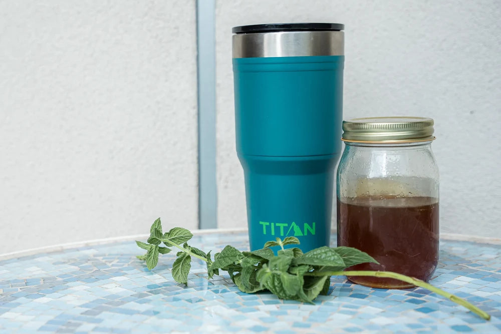 Titan 30 Oz Stainless Steel Tumbler next to ice tea ingredients