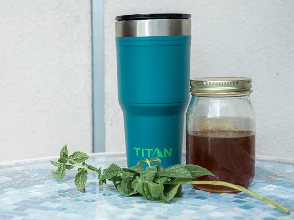 Titan 30 Oz Stainless Steel Tumbler next to ice tea ingredients