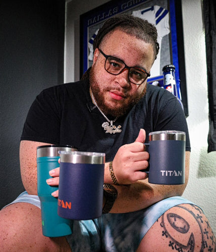 Chef Hoppie holding up Titan by Arctic Zone Drinkware
