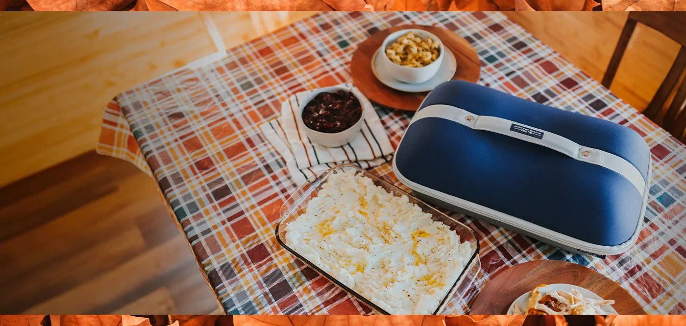 Arctic Zone Food Pro Casserole Carrier on a table set for Thanksgiving.